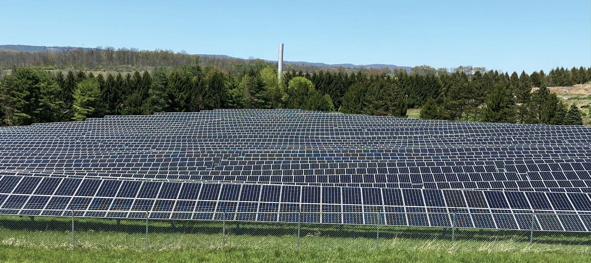 Landscape-level view of a large field covered with solar panels. Credit: Penn State MCOR