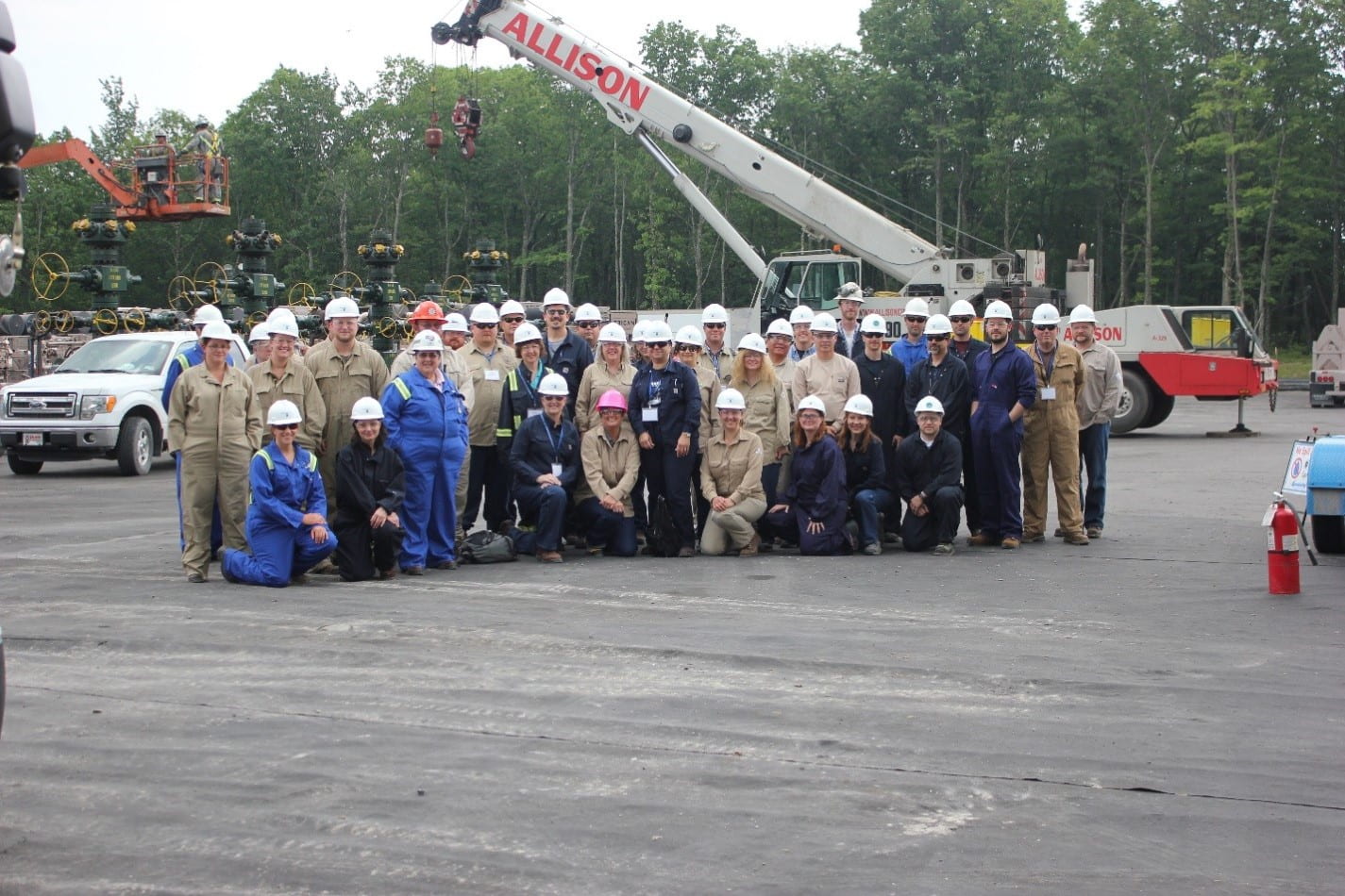 A group of people in a TOPCORP training class on a shale gas drilling pad. Credit: Penn State MCOR