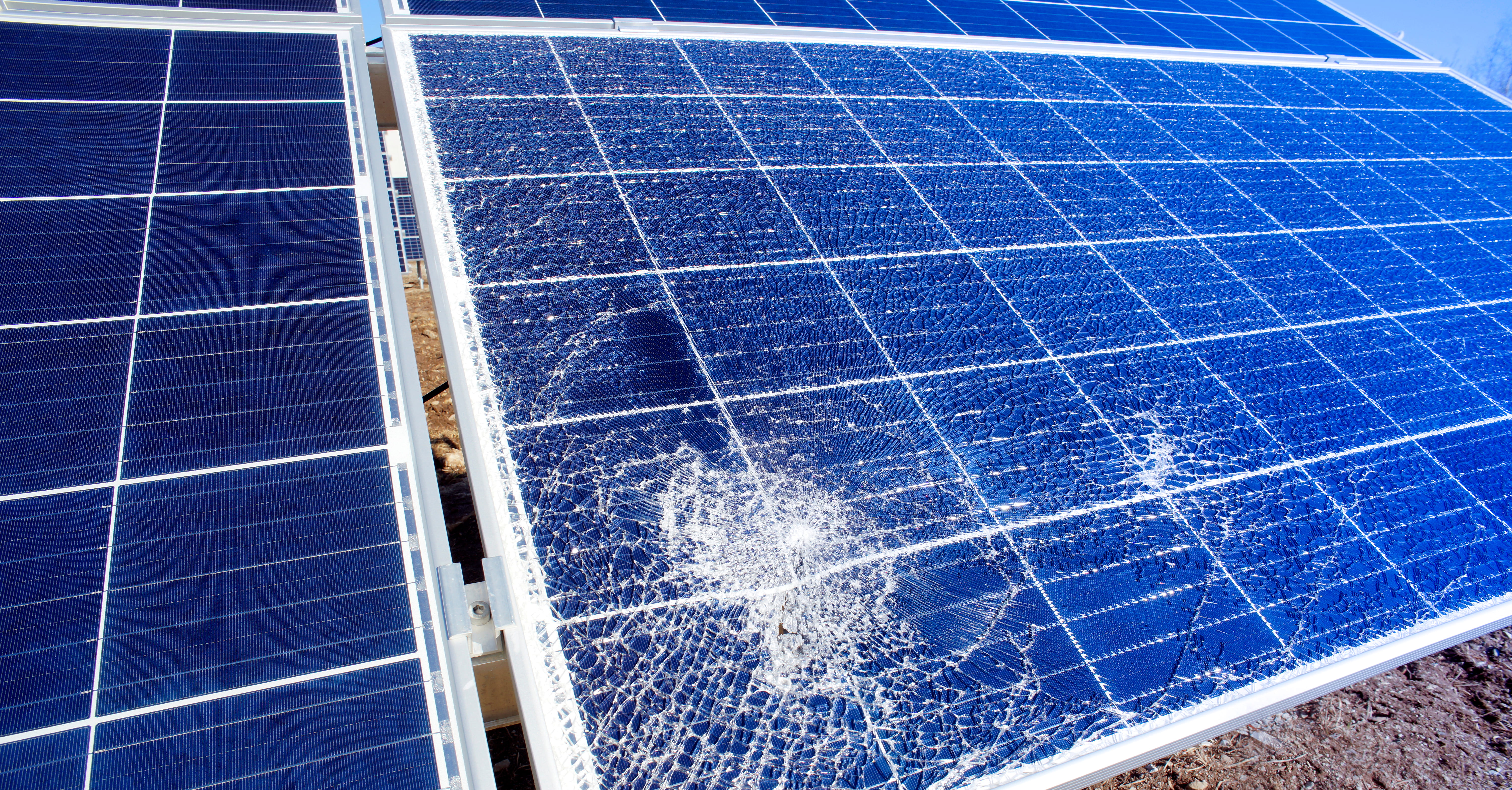 A broken solar panel. The pieces in a broken solar panel typically remain together in a sheet. Credit: nostal6ie, Shutterstock